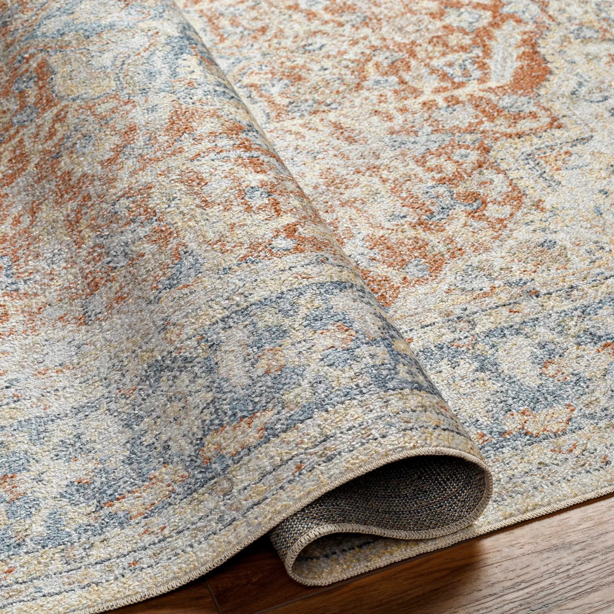 Emke Rust Washable Area Rug - Clearance by Boutique Rugs
