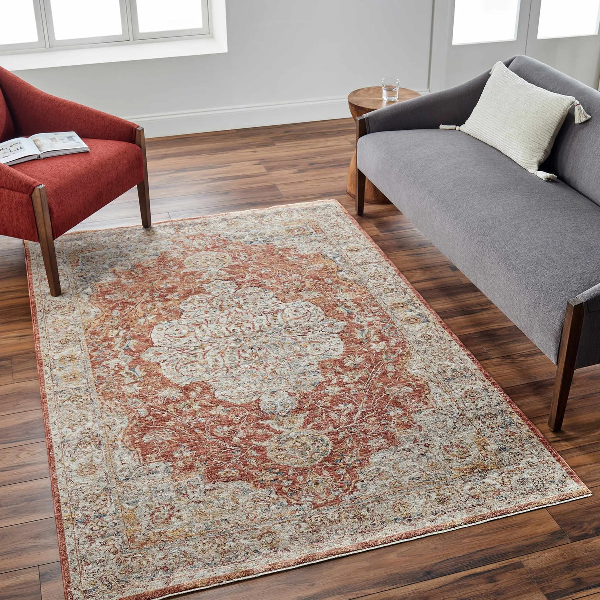Aman Rust Area Rug - Clearance, installed in a room