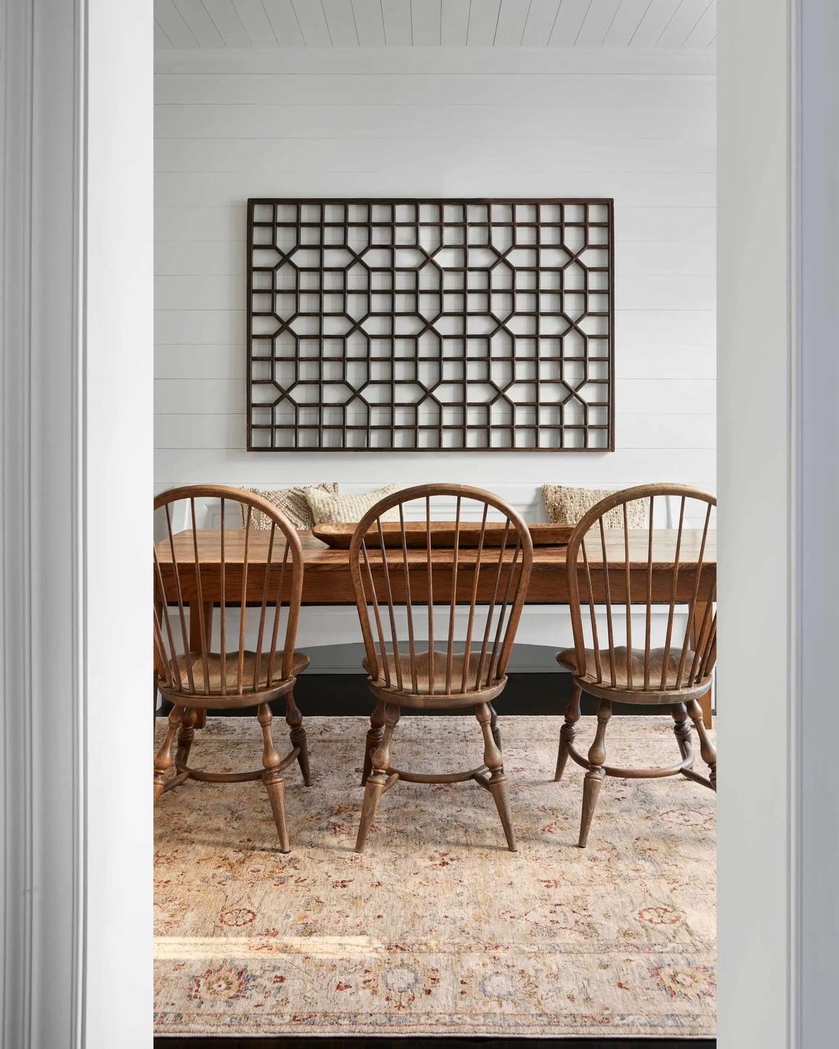 Duong Beige Textured Rug with Fringes, installed in a room