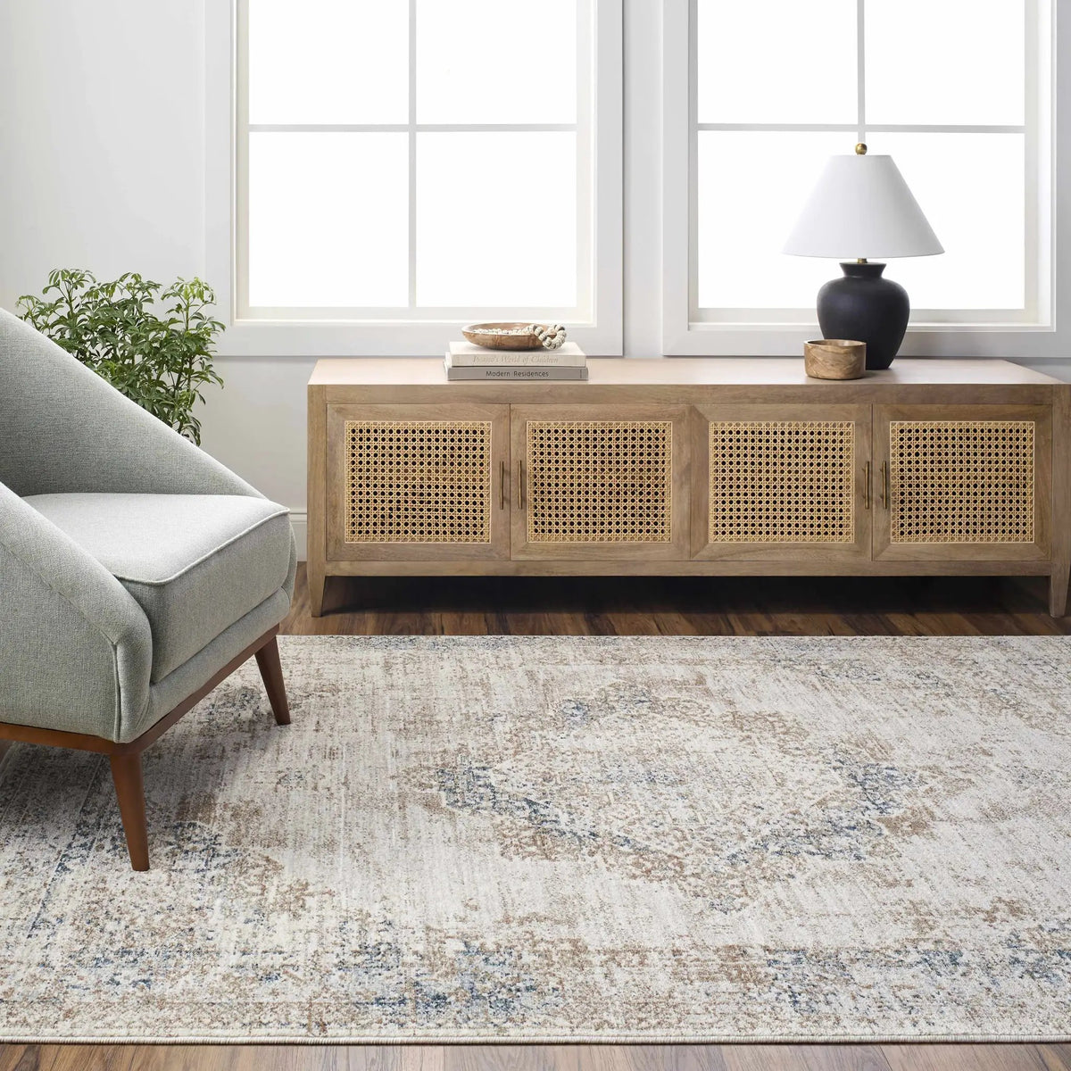 Kosta Beige & Blue Medallion Area Rug - Clearance, installed in a room