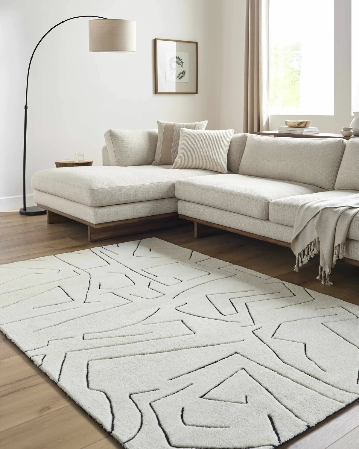Mony Rose Cream Area Rug - Clearance, installed in a room