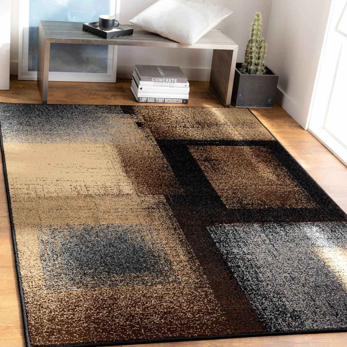Spraggs Area Rug - Clearance, installed in a room