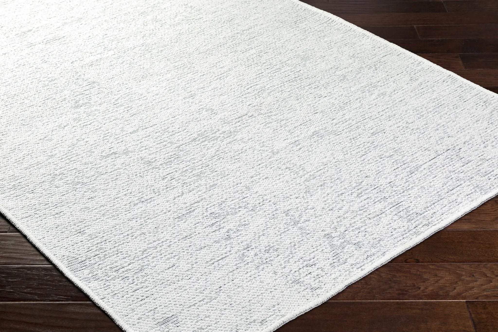Isako Cream & Gray Solid Washable Area Rug - Clearance by Boutique Rugs