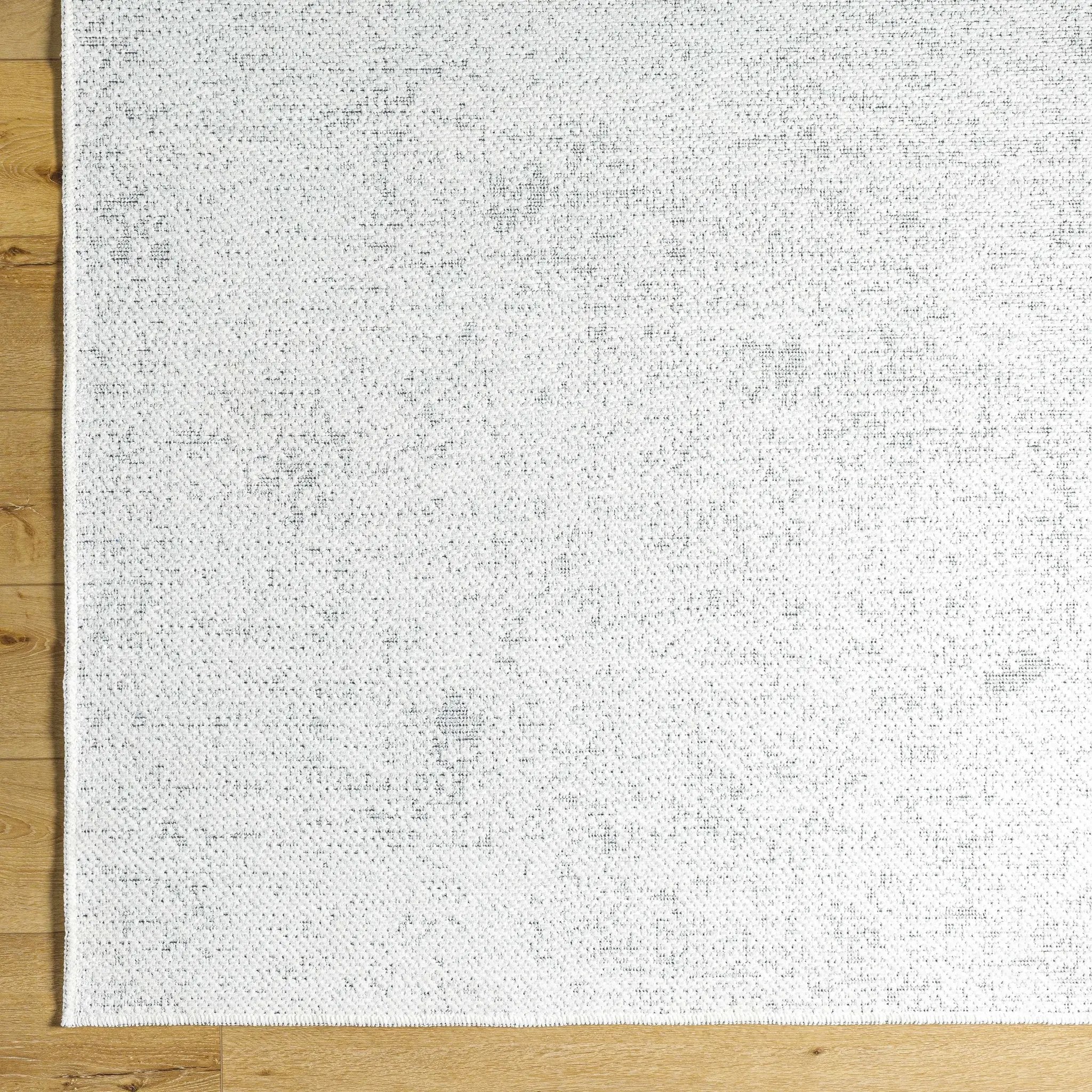 Isako Cream & Gray Solid Washable Area Rug - Clearance by Boutique Rugs