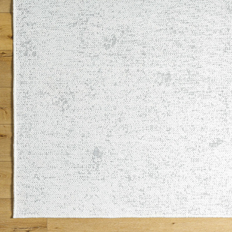 Isako Cream & Gray Solid Washable Area Rug - Clearance by Boutique Rugs
