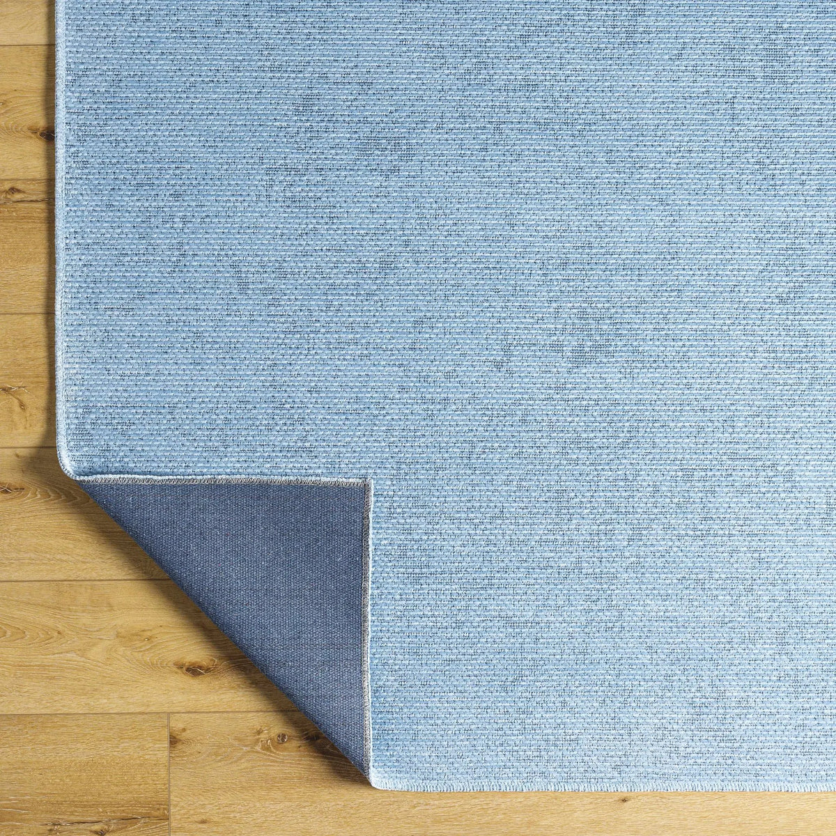 Isako Blue Solid Washable Area Rug - Clearance, photo 7 of 11