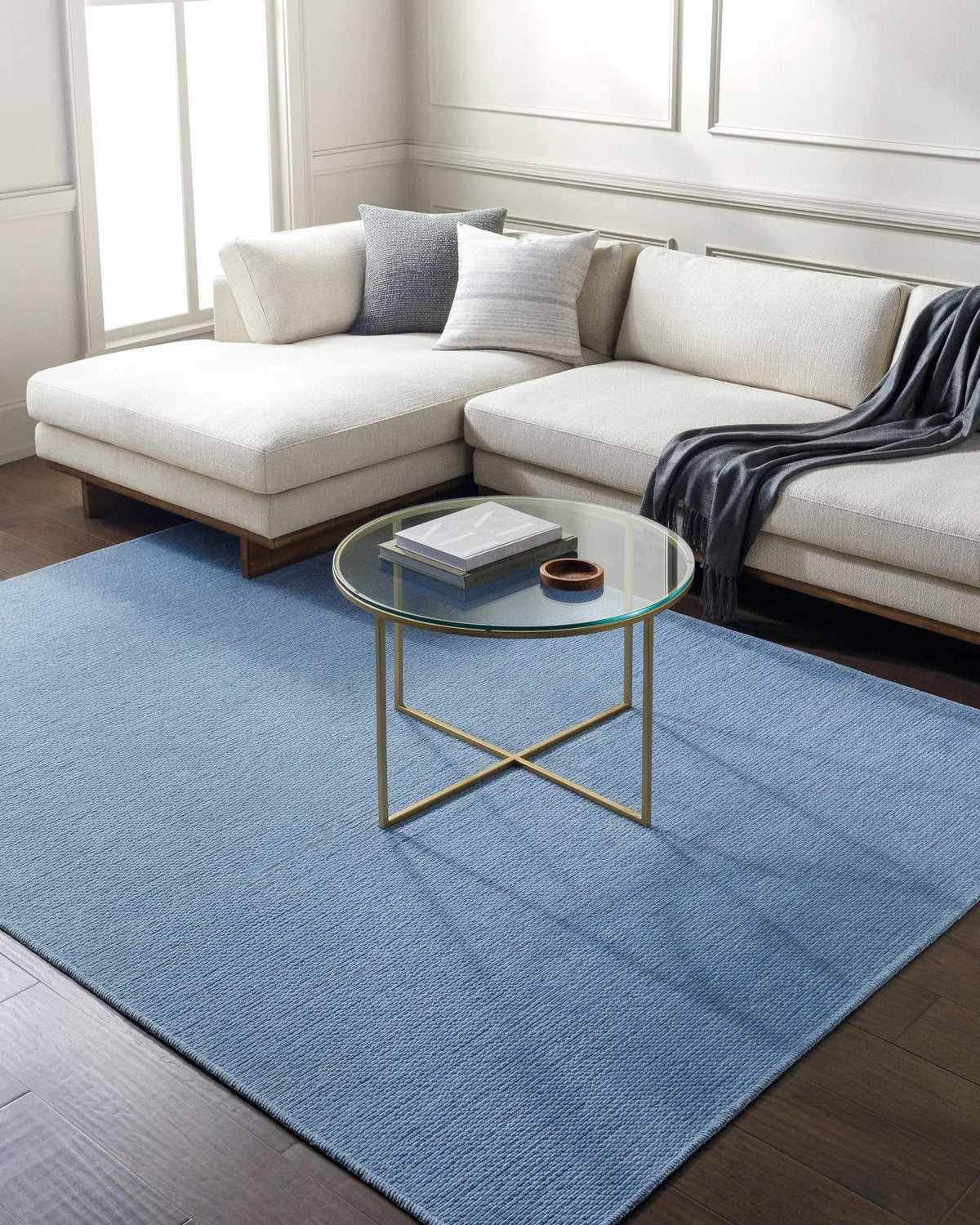 Isako Blue Solid Washable Area Rug - Clearance, installed in a room