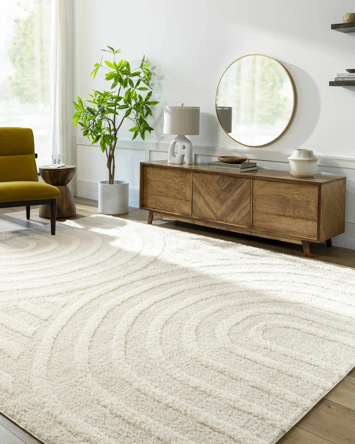 Arnel Cream Area Rug, installed in a room