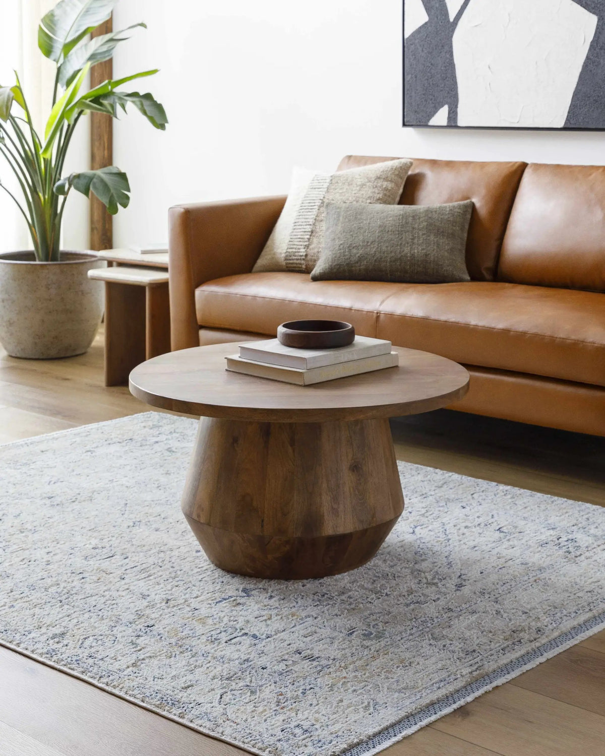 Charo Dusty Sage Area Rug, installed in a room