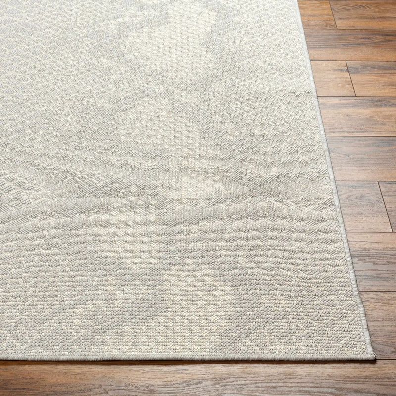 Estee Cream Snake-Patterned Outdoor Area Rug - Clearance by Boutique Rugs