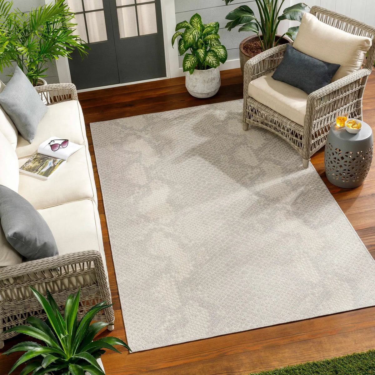Estee Cream Snake-Patterned Outdoor Area Rug - Clearance, installed in a room