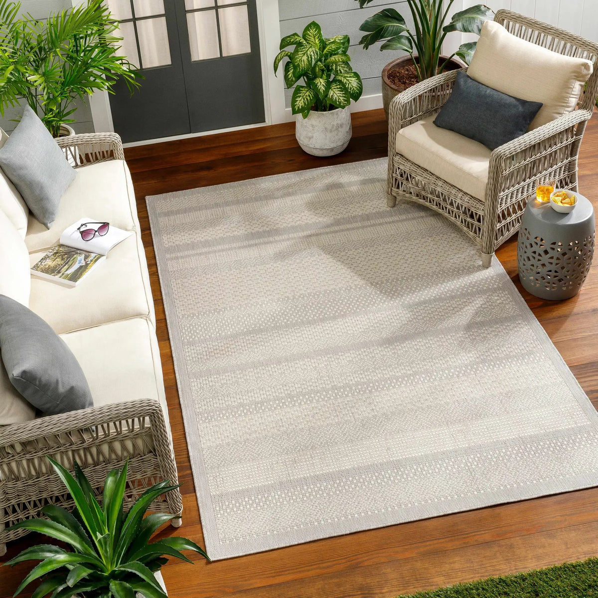 Hessa Cream Outdoor Area Rug - Clearance, installed in a room