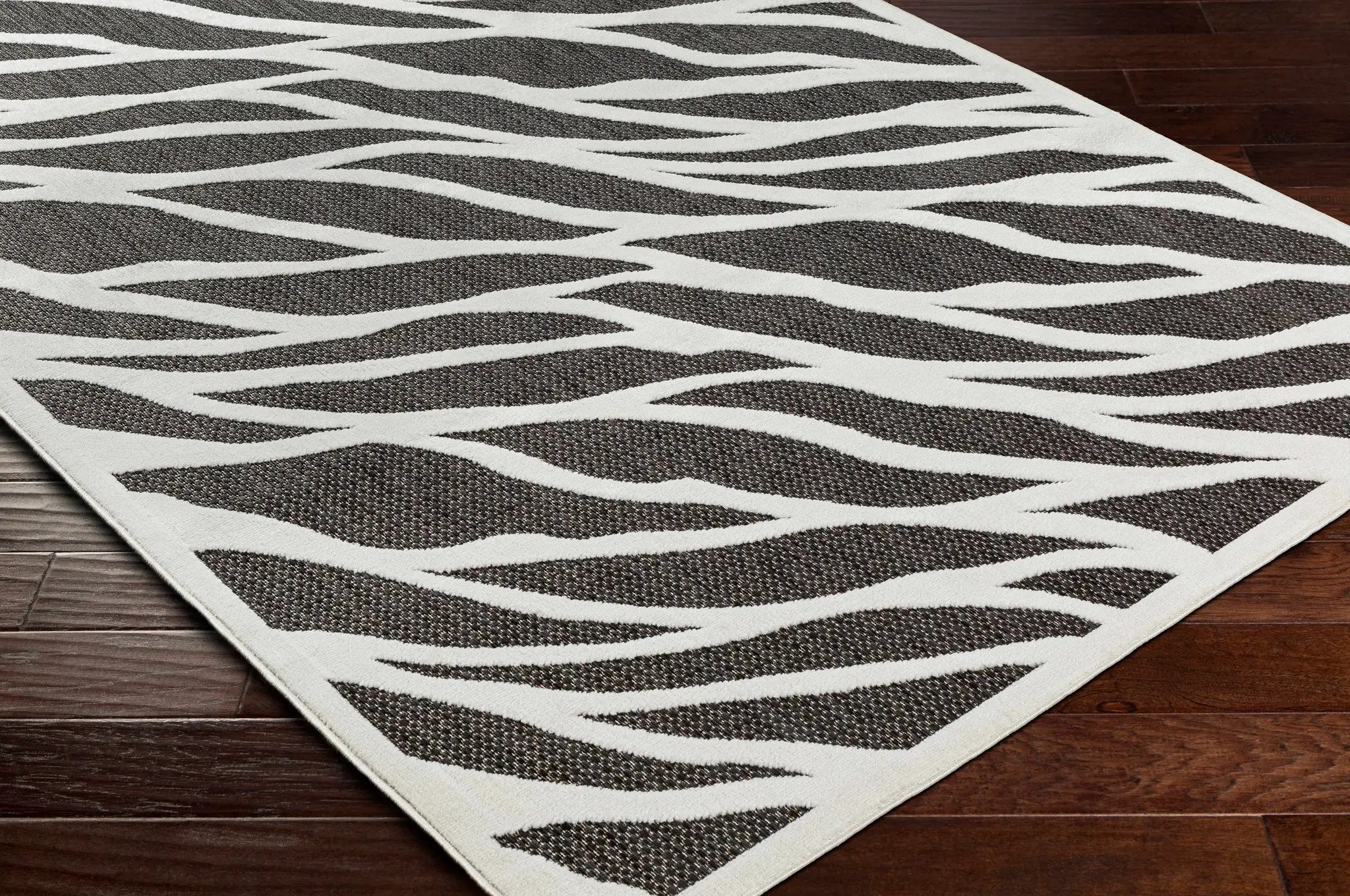 Astra Zebra Print Black Outdoor Rug - Clearance by Boutique Rugs