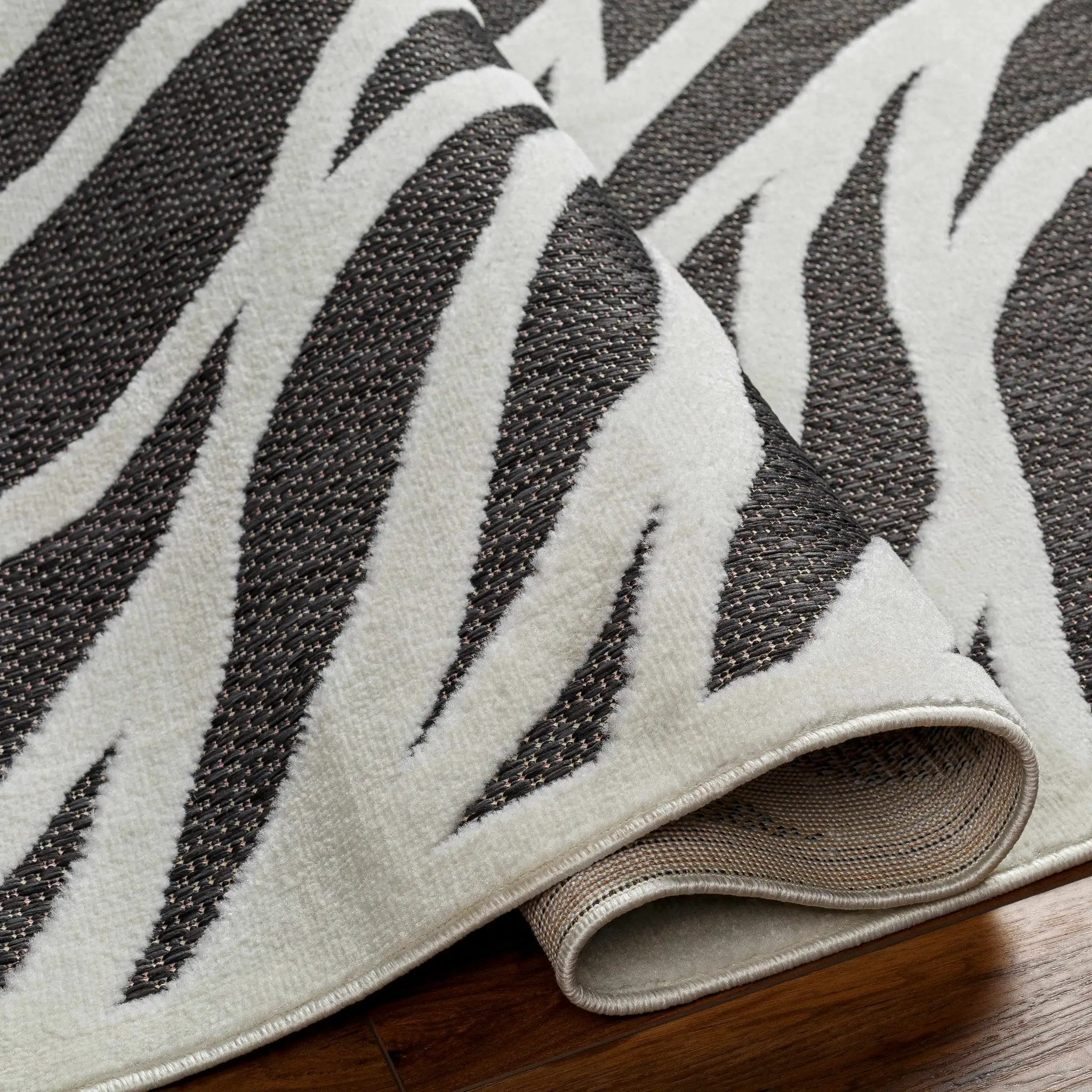 Astra Zebra Print Black Outdoor Rug - Clearance by Boutique Rugs