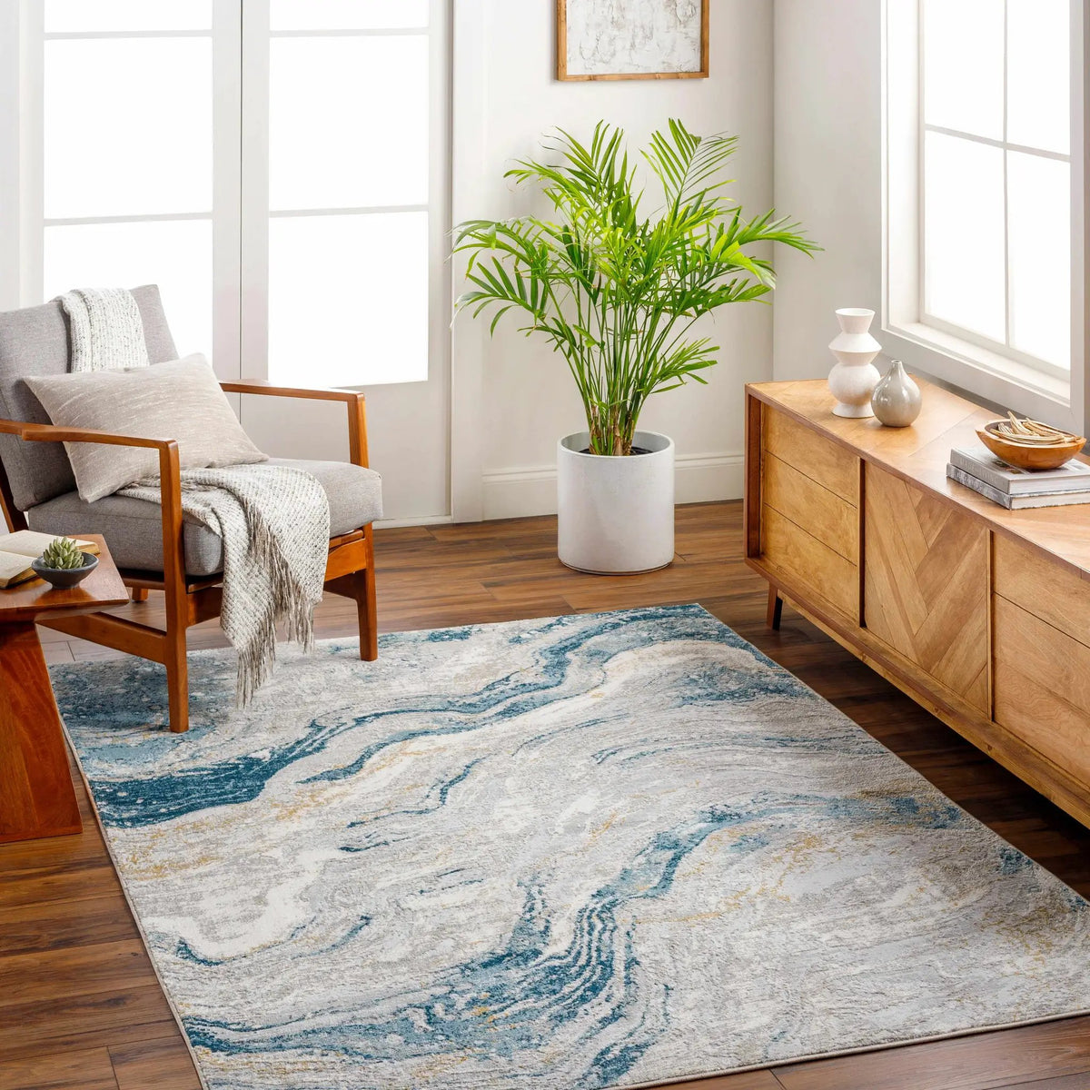 Tess Silver Blue Marble Area Rug - Clearance, installed in a room