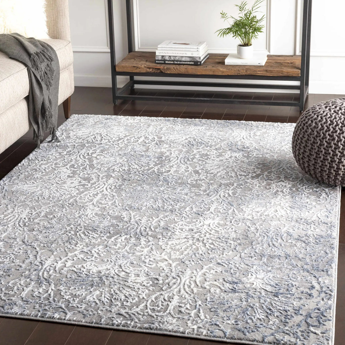 Statham Area Rug - Clearance, installed in a room