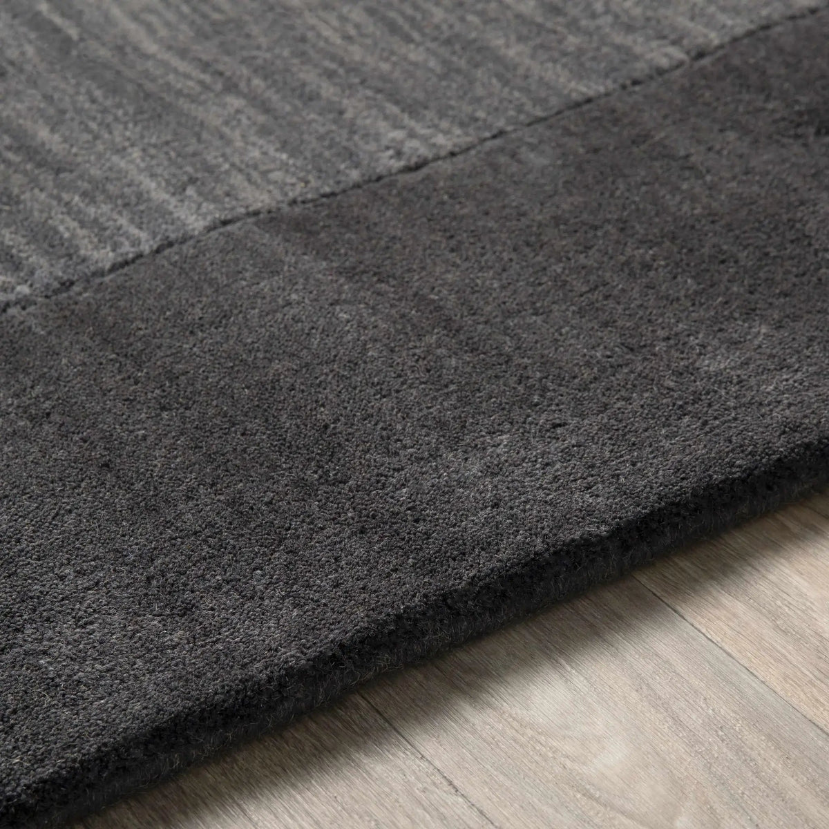 Bordered Solid Black Charcoal Wool Rug, photo 9 of 17