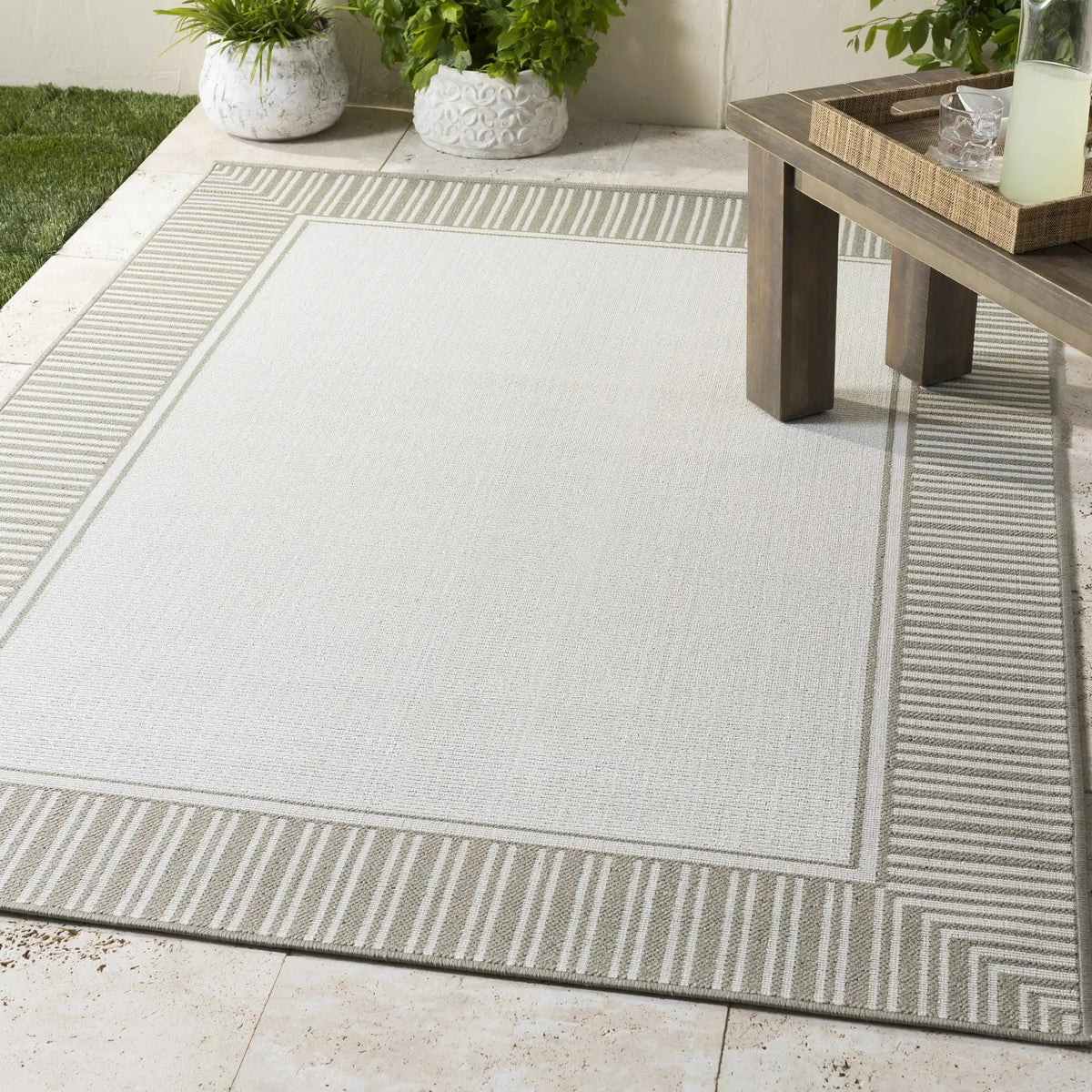 Tickfaw Outdoor Area Rug - Clearance, installed in a room