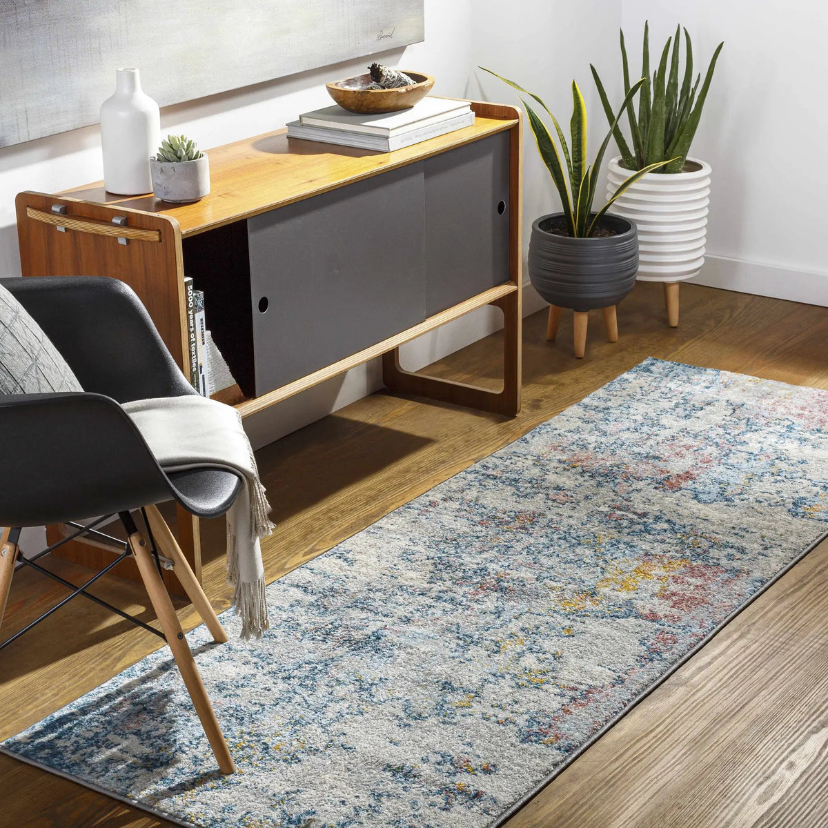 Tambalisa Abstract Area Rug, installed in a room 2