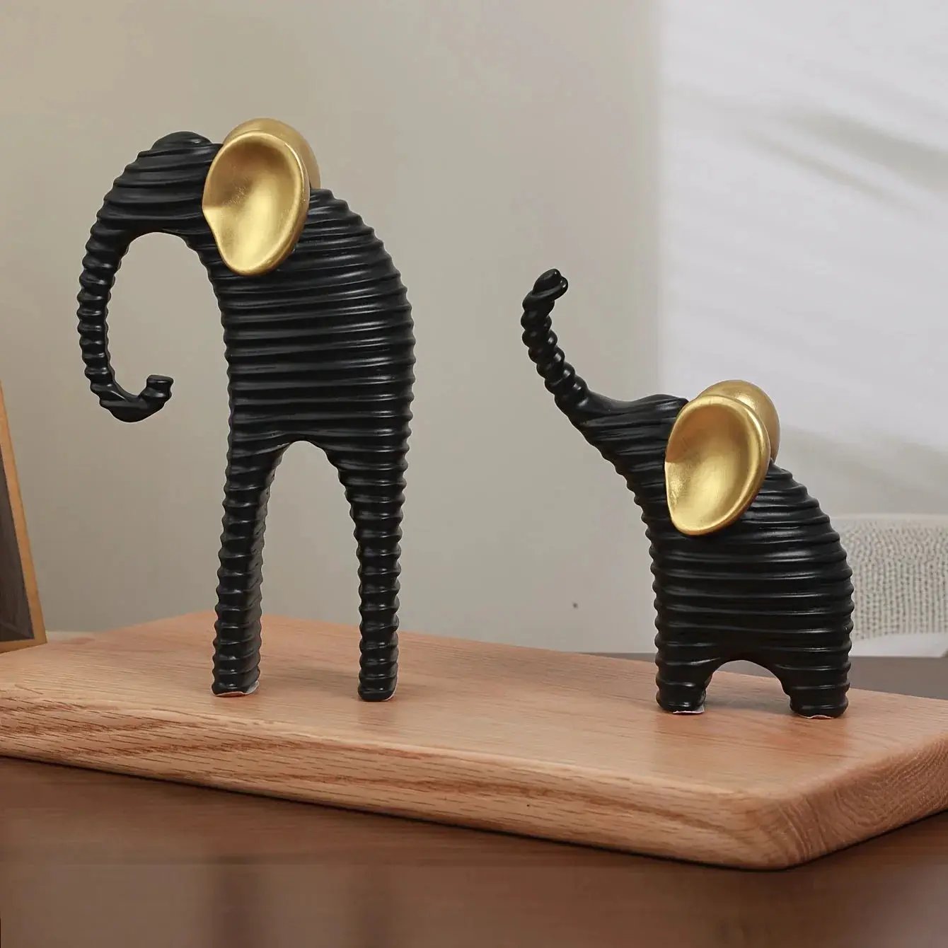 Two High-End Black And Golden/White And Golden Parent- Elephant Figurines for Home Decor, Suitable for Living Rooms, Entryways, Wine Cabinets, And TV Stands. by House Of Avana
