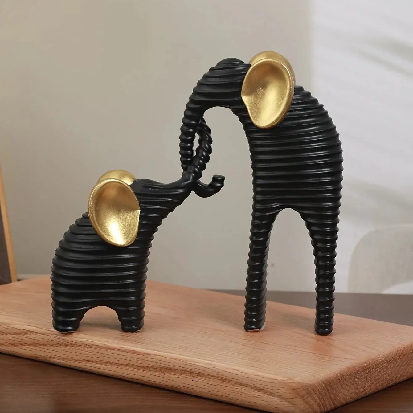 Two High-End Black And Golden/White And Golden Parent- Elephant Figurines for Home Decor, Suitable for Living Rooms, Entryways, Wine Cabinets, And TV Stands. by House Of Avana