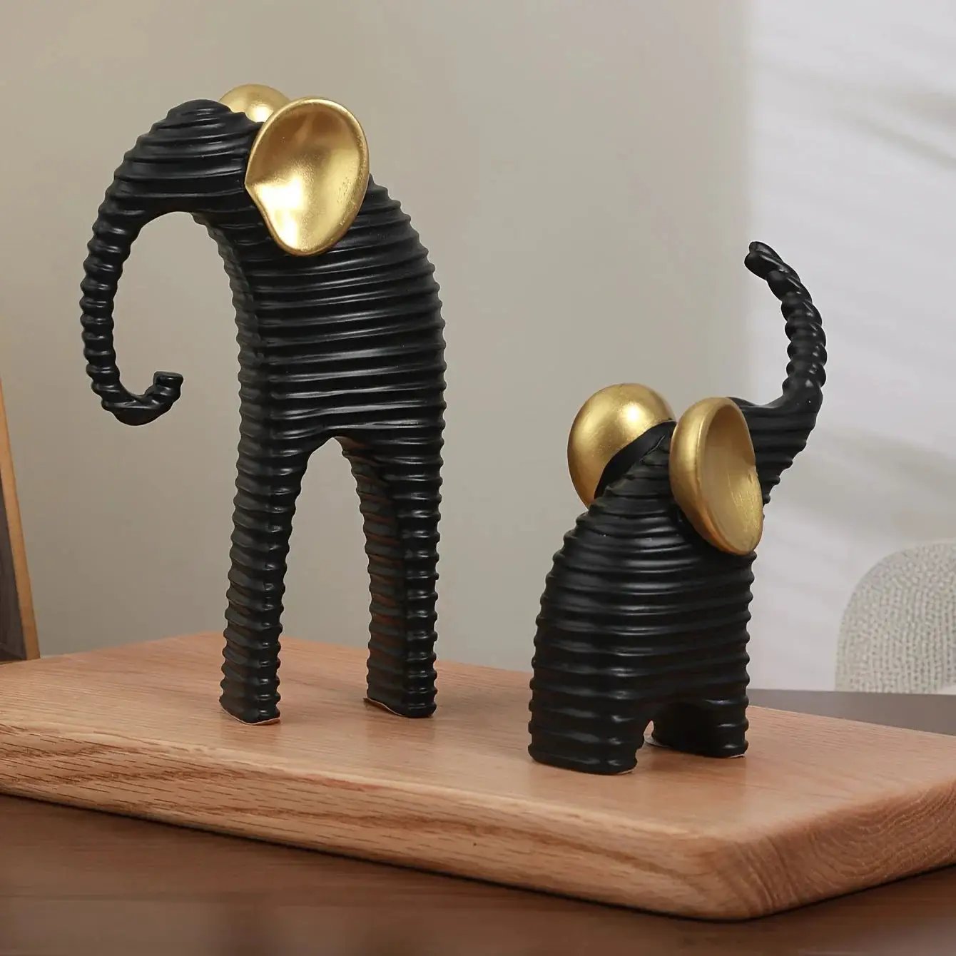 Two High-End Black And Golden/White And Golden Parent- Elephant Figurines for Home Decor, Suitable for Living Rooms, Entryways, Wine Cabinets, And TV Stands. by House Of Avana
