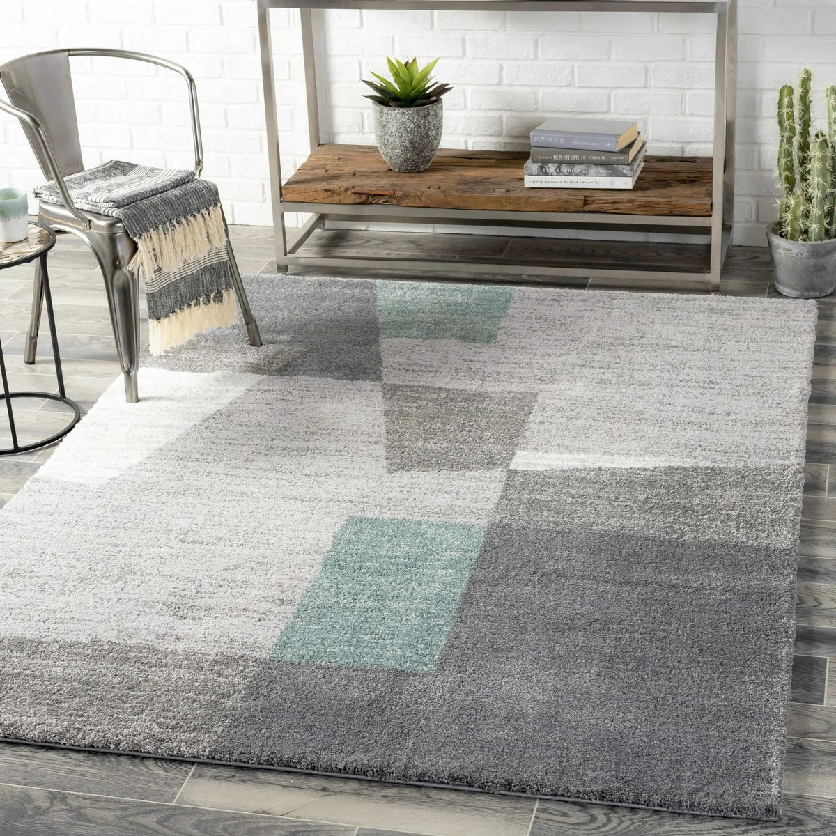 Tytherington Geometric Sage Area Rug - Clearance, installed in a room