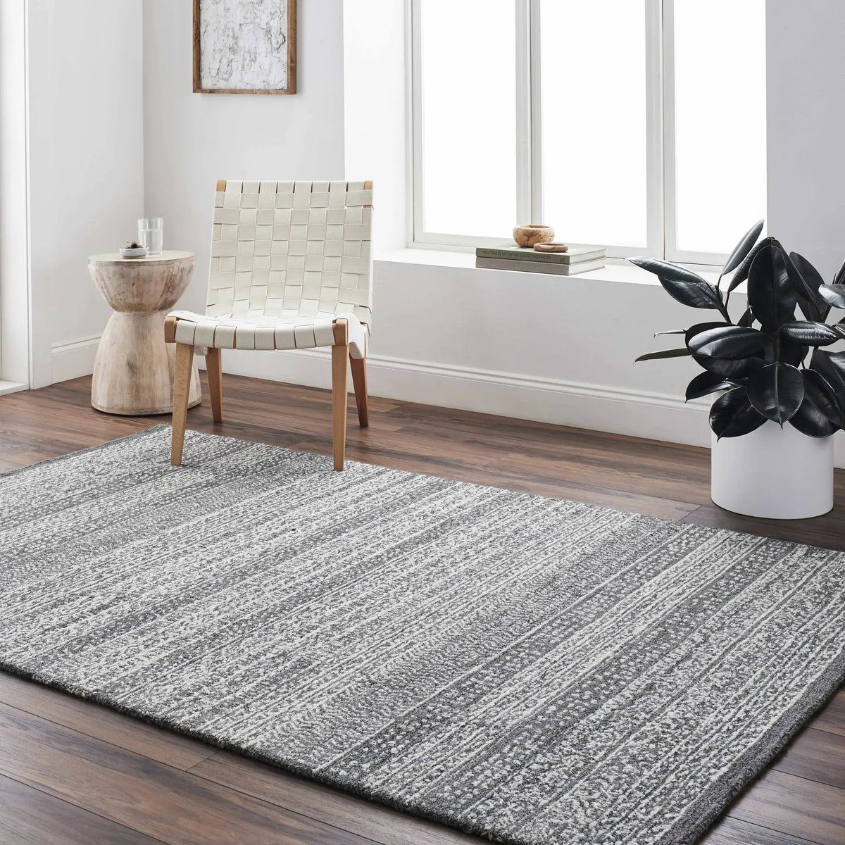 Urvi Area Rug, installed in a room