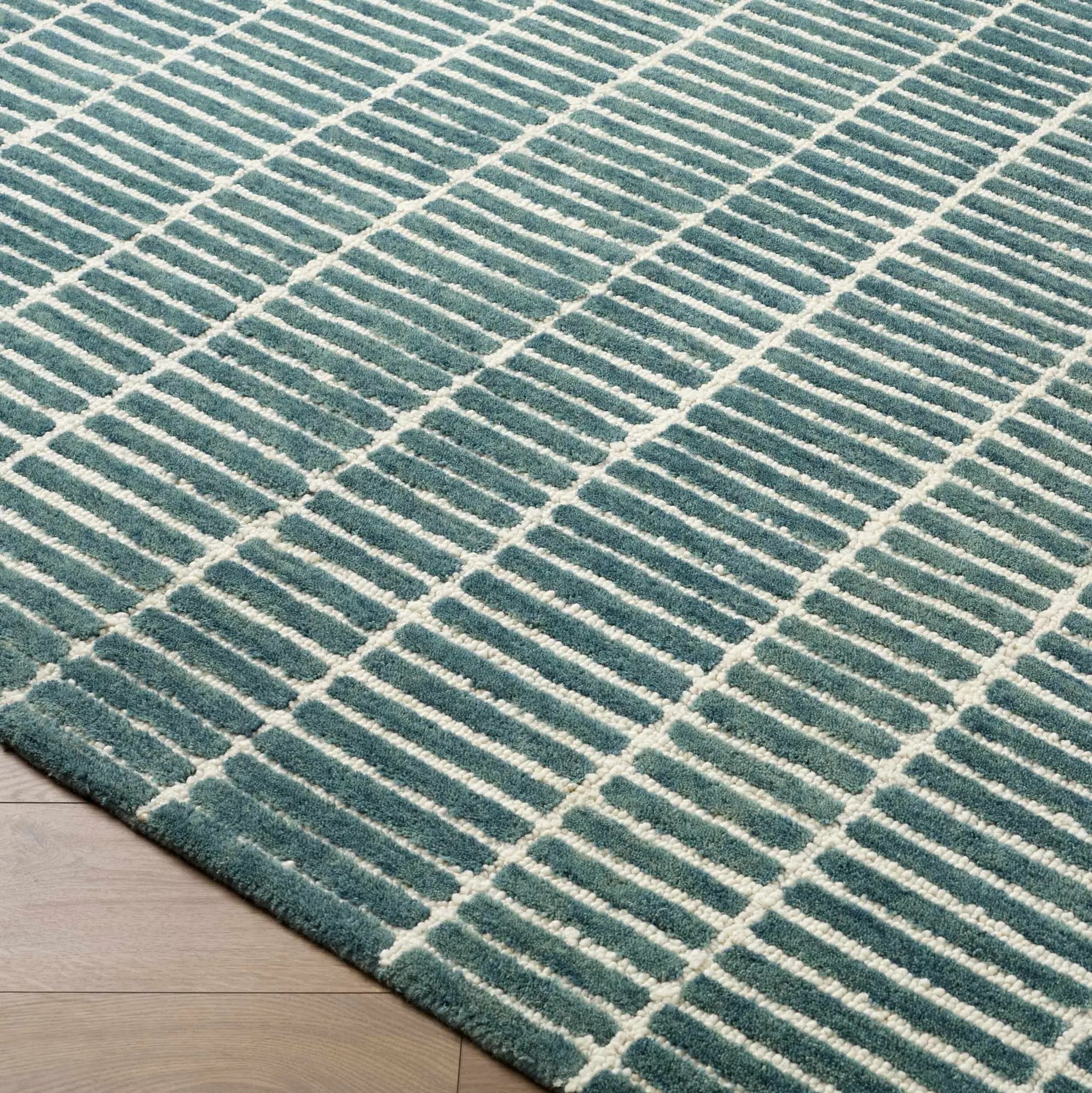 Finial Blue Wool Area Rug by Boutique Rugs