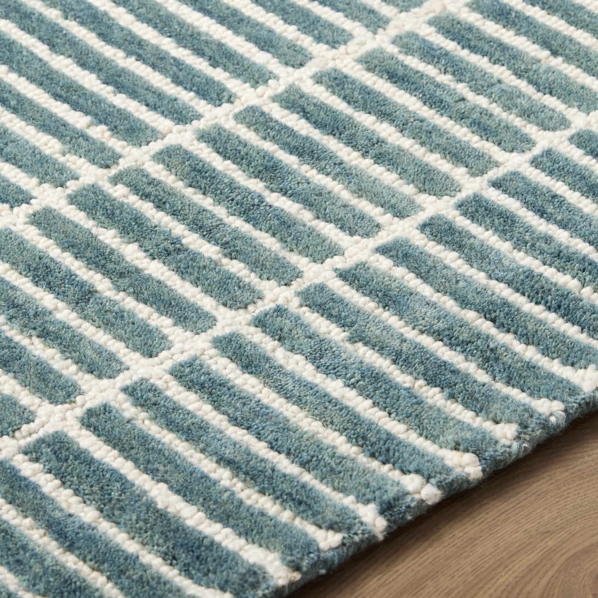 Finial Blue Wool Area Rug by Boutique Rugs