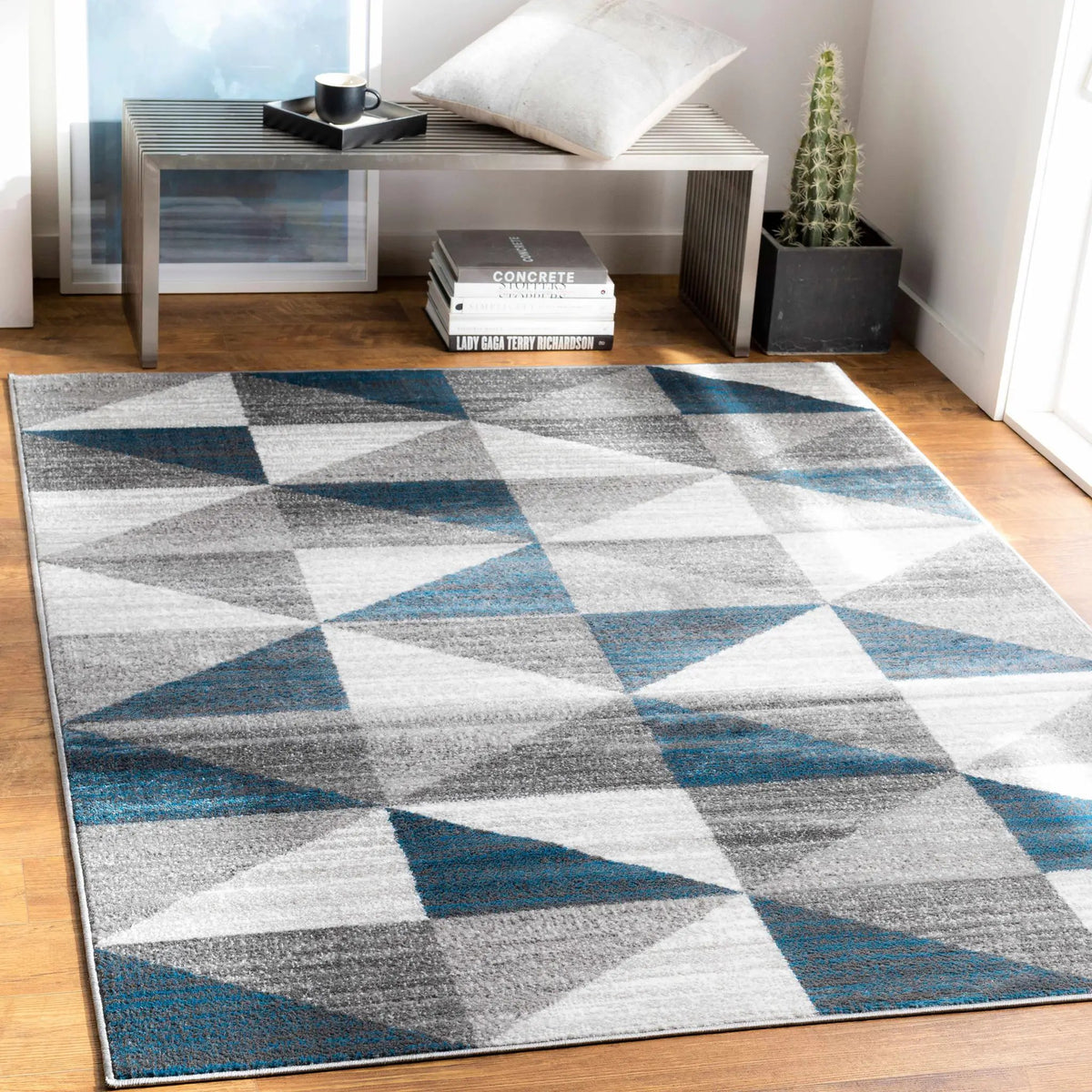 Volant Area Rug, installed in a room