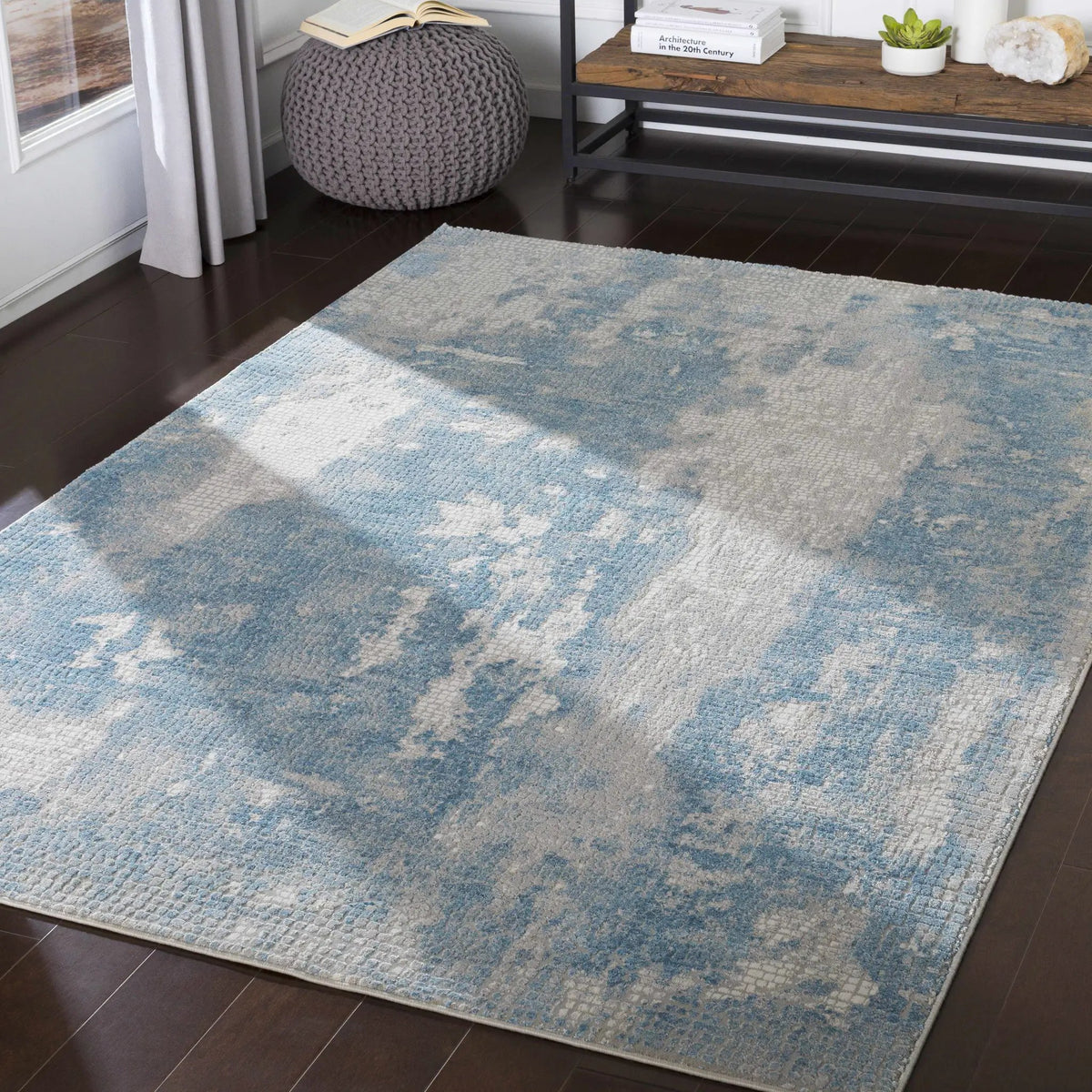 Walbridge Faux Silk Rug, installed in a room