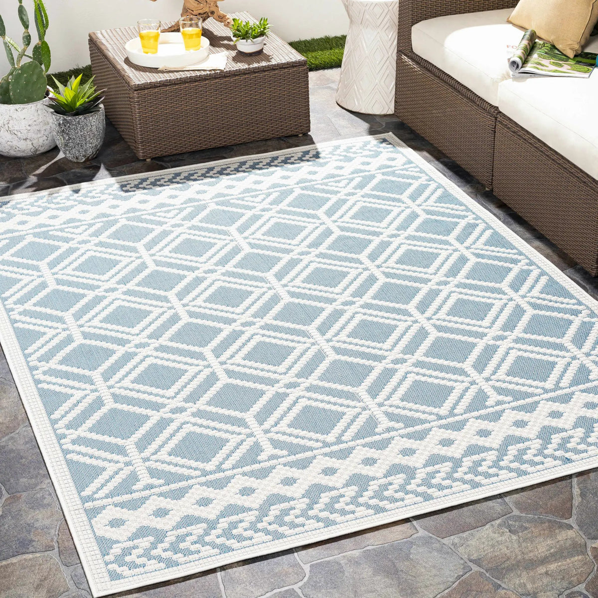 Wingina 8x10 Ice Blue Trellis Outdoor Rug - Clearance, installed in a room