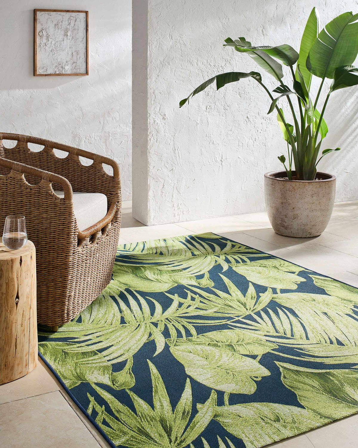 Amirah Teal Outdoor Area Rug, installed in a room