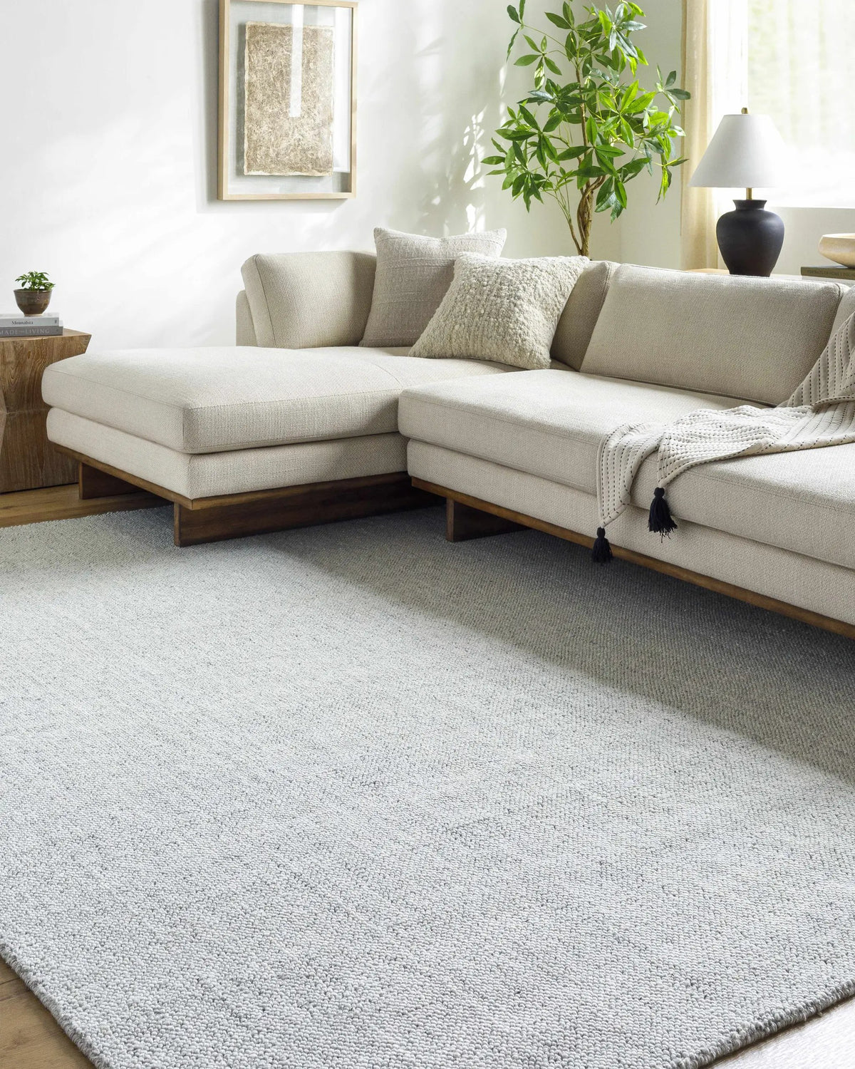 Zareh Gray Blue Solid Area Rug - Clearance, installed in a room